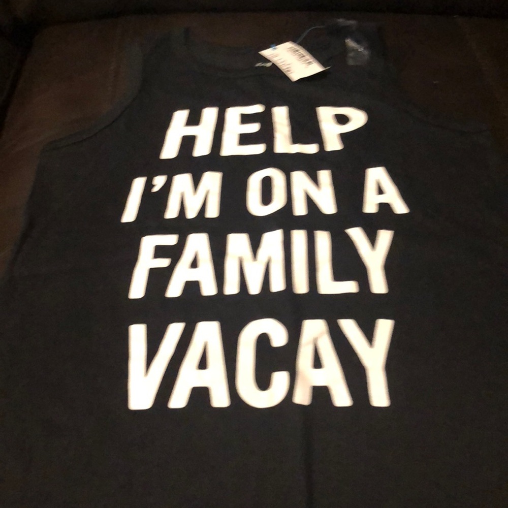 Boys: 2 tank tops medium 10/12.  $8.00 for Both